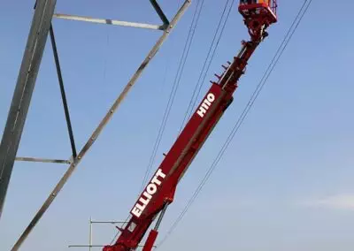 h 110 f truck near electrical tower