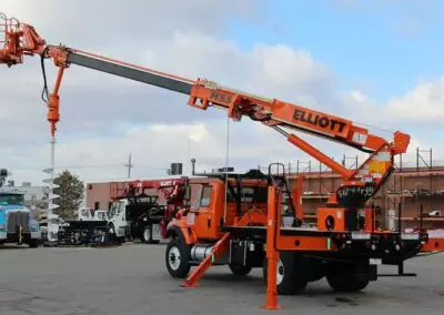 Orange H 55 R truck with drill attachment
