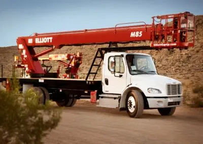 red m 85 truck in desert