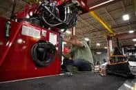 Elliott employee working on unit Elliott employee working on unit
